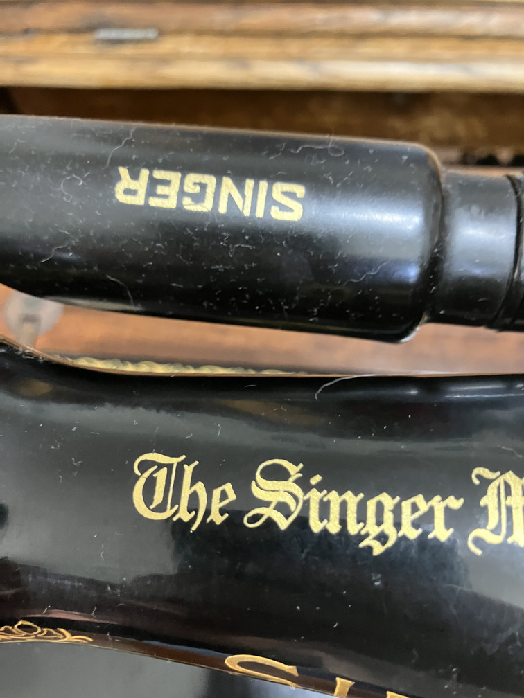 Arm with Singer decal